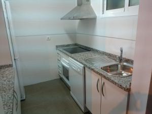 Køkken eller tekøkken på Candela 55 Dúplex con terraza y piscina