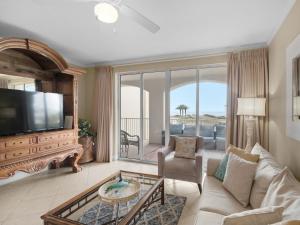 Et tv og/eller underholdning på San Remo Condominium 203 by Newman-Dailey