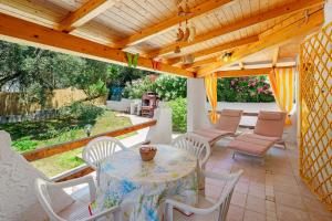 A seating area at MIO & TUYO CASE VACANZE