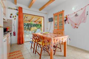 A kitchen or kitchenette at MIO & TUYO CASE VACANZE