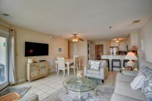 a living room with a couch and a table at Villa Capriani 315B in Chadwick Acres