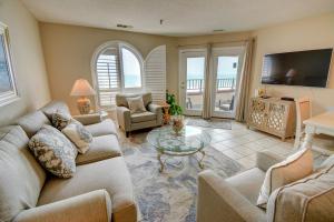 a living room with a couch and a table at Villa Capriani 315B in Chadwick Acres