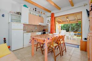 A kitchen or kitchenette at MIO & TUYO CASE VACANZE