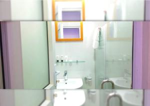 Bilik mandi di Apartment 79 Hotel & Suite