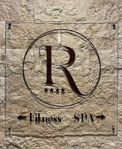 Hôtel & Spa Rocabella的证书、奖牌、标识或其他文件