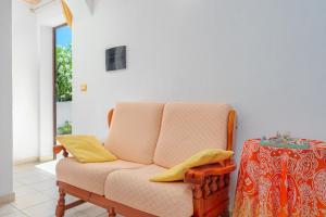 A television and/or entertainment centre at MIO & TUYO CASE VACANZE