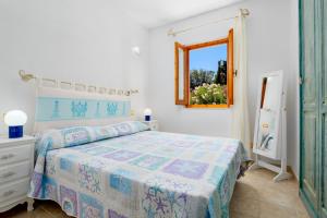 A bed or beds in a room at MIO & TUYO CASE VACANZE