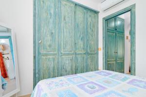 A bed or beds in a room at MIO & TUYO CASE VACANZE