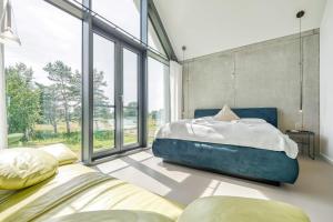 Postel nebo postele na pokoji v ubytování Ferienhaus Peak TWO
