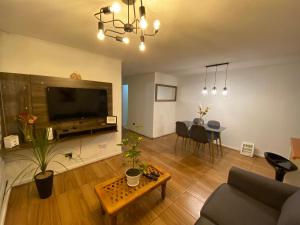 TV a/nebo společenská místnost v ubytování Apartamento Céntrico + 3 fotografie