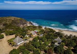 an aerial view of a resort on the beach at Cabañas Linda Vista in Chimo