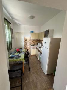 Kuchyň nebo kuchyňský kout v ubytování Apartments Ferguson