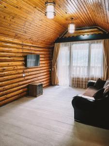 TV a/nebo společenská místnost v ubytování Hotel Chveneburi
