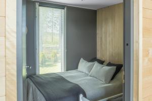 Ένα ή περισσότερα κρεβάτια σε δωμάτιο στο Villa Bläk