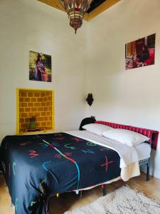 Postel nebo postele na pokoji v ubytování Le Retour au calme Maison d'hôtes + 37 fotografií
