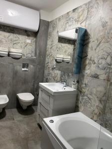 Koupelna v ubytování Villa spazio sa con giardino e vista mare + 14 fotografií