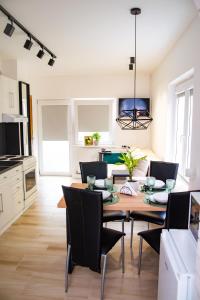 TV a/nebo společenská místnost v ubytování Josephine Apartment