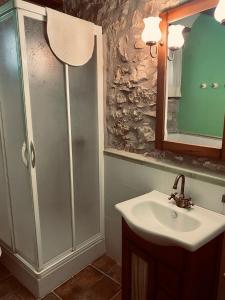 Koupelna v ubytování Hostal La Muralla