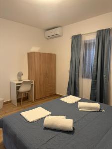 Postel nebo postele na pokoji v ubytování Seaside PERLA Apartment