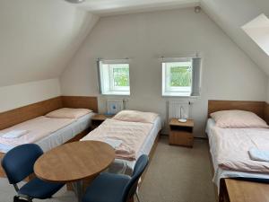 Postel nebo postele na pokoji v ubytování Apartmán 4 - ČASPV