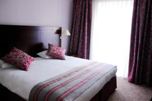 Letto o letti in una camera di Europe Hotel