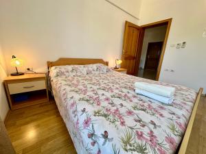 Postel nebo postele na pokoji v ubytování Guest House Maxi