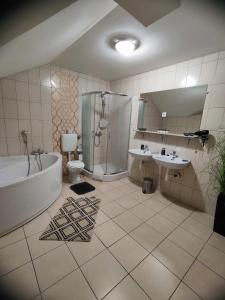 Koupelna v ubytování Apartments Tome