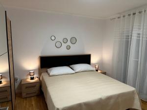 Posteľ alebo postele v izbe v ubytovaní Holiday House Lilija
