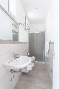 Koupelna v ubytování Hotel Katina