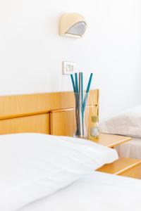 Postel nebo postele na pokoji v ubytování Hotel Katina