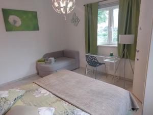 Postel nebo postele na pokoji v ubytování Apartment Mia