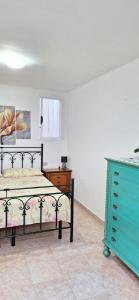 Postel nebo postele na pokoji v ubytování casa al mare kalispera