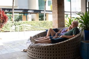 Uma área de estar em Hotel Morada do Sol