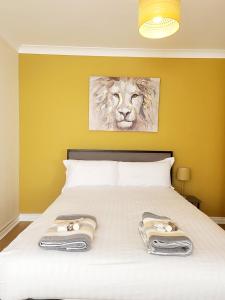 Ένα ή περισσότερα κρεβάτια σε δωμάτιο στο Romulus Court Fenham