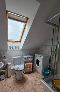 Koupelna v ubytování Apartament na Gryfa 8
