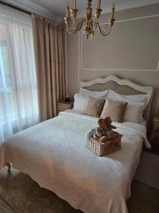 Posteľ alebo postele v izbe v ubytovaní Wyjatkowy apartament w sercu Gdańska