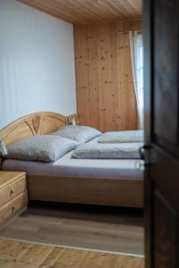 Postel nebo postele na pokoji v ubytování Almhaus Veitlmichl