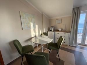 Η κουζίνα ή μικρή κουζίνα στο Guest house Adria