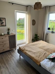 Postel nebo postele na pokoji v ubytování Baltic Gem