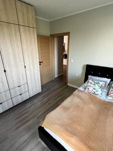 Postel nebo postele na pokoji v ubytování Baltic Gem
