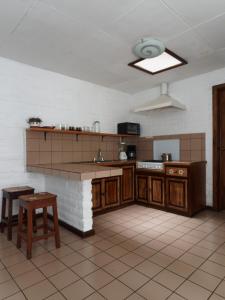 Kuchyň nebo kuchyňský kout v ubytování Apartamentos Otorongo Cuenca Ecuador