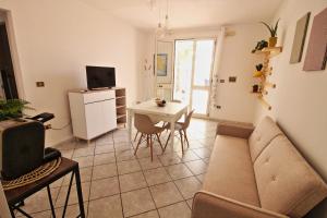 TV a/nebo společenská místnost v ubytování Residence Mare Azzurro