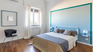 A bed or beds in a room at 90100