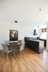 Μια τηλεόραση ή/και κέντρο ψυχαγωγίας στο Apartment Alm View, im Oberharz