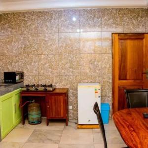 Kuchyň nebo kuchyňský kout v ubytování Paisible appart a la base industrielle