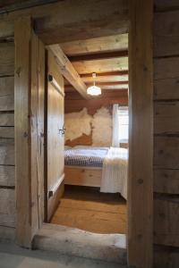 Tempat tidur dalam kamar di Schwadenguetl
