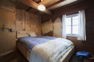 Tempat tidur dalam kamar di Schwadenguetl