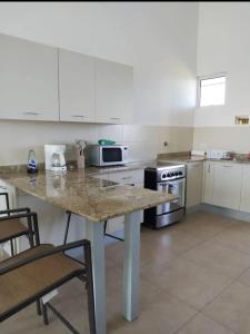 Kuchyň nebo kuchyňský kout v ubytování Gulf View San Carlos 4bd SeaView Condo Near El Valle & Coronado + 8 fotografií