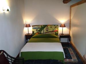 Postel nebo postele na pokoji v ubytování Casa da Figueira