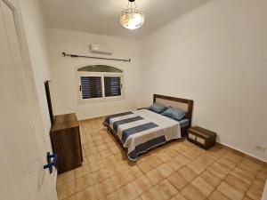 En eller flere senge i et værelse på Cairo